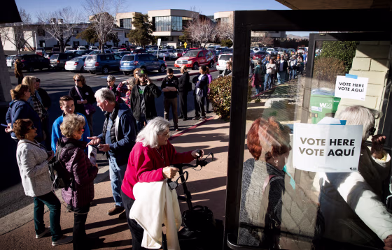 Image: Voters arrive to vote early in the Nevada caucuses in Reno on Feb. 18, 2020.