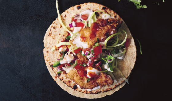Fried, baked or broiled, no matter how you cook your fish, it can always be improved with a simple salsa and some lime-flecked crema.