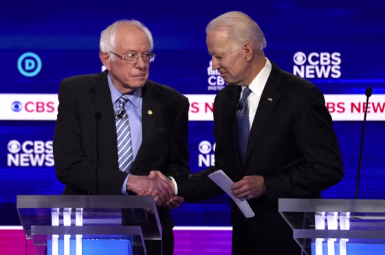 Image: Democratic 2020 U.S. presidential candidates Senator Bernie Sanders shakes hands with former Vice President Joe Biden after the tenth Democratic 2020 presidential debate at the Gaillard Center in Charleston, South Carolina