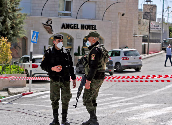 Image: Palestinian security forces seal off the Angel Hotel