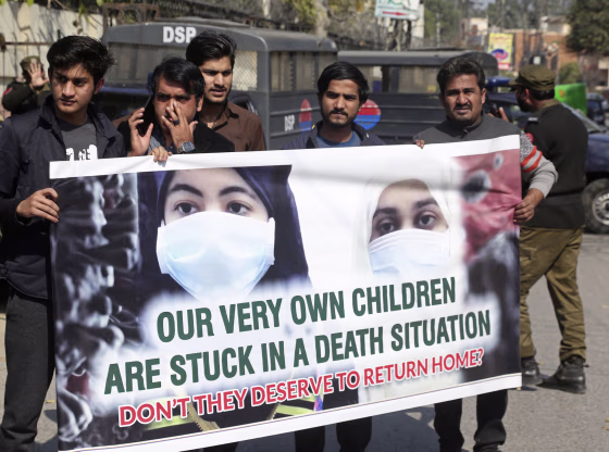 Image: Family members of Pakistani students studying in Wuhan, China, rally outside the Chinese Consulate for the evacuation of their relatives after the Chinese city was badly hit by the coronavirus, in Lahore, Pakistan