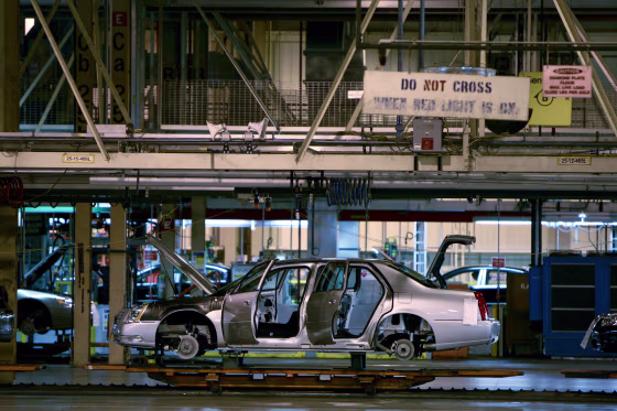 Image: A Cadillac DTS sedan makes its way down the assembly line at the General Motors Co. Detroit-Hamtramck plant in Detroit, Michigan.