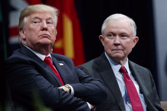 Image: President Donald Trump, left, sits with Attorney General Jeff Session