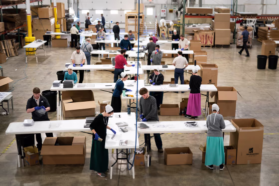 Image: Employees make face shields inside a Berlin Gardens warehouse in Millersburg, Ohio, Friday, April 3, 2020. (Erin Schaff/The New York Times)
