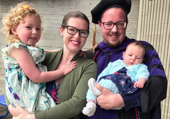 Emmett Hardiman with his wife, Calla, and two daughters.