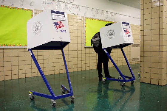 Image: Person votes during the midterm election at P.S. 140 in Manhattan, New York City