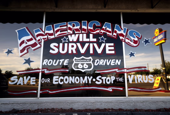 Image: An automobile sign sends a positive message in the fight against coronavirus in Kingman, Ariz., on May 24, 2020.