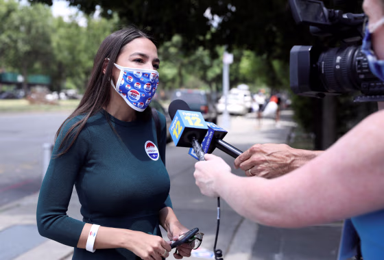 Image: U.S. Rep. AOC votes early in Democratic congressional primary election in New York City
