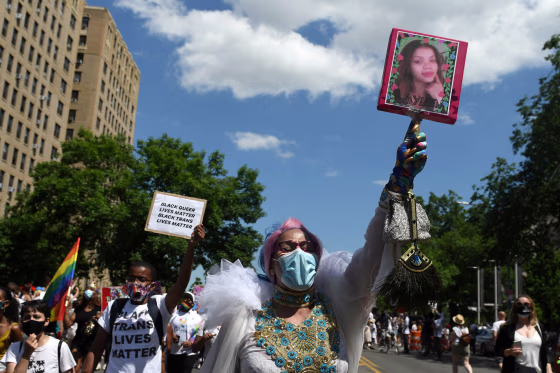 Image: People participate in a Black Trans Lives Matter rally