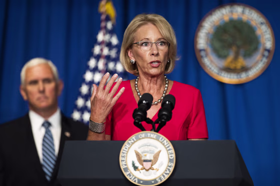 Image: Mike Pence, Betsy DeVos