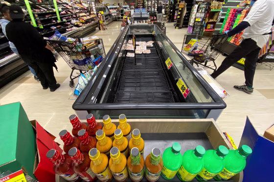 Image: FILE PHOTO: Customers browse grocery store shelves inside Kroger Co.'s Ralphs supermarket amid fears of the global growth of coronavirus cases, in Los Angeles