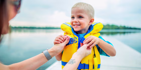 When it comes to choosing a child’s life vest, factors like weight, swimming ability and activity they’ll be doing are important to keep in mind.