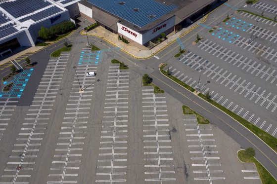 A J.C. Penney department store seen above empty parking lots at Woodbridge Center Mall that remains closed due to the ongoing outbreak of the coronavirus disease in Woodbridge Township, N.J., on May 21, 2020.
