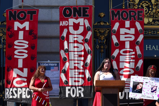 Annita Lucchesi, director of the Sovereign Bodies Institute, speaks at a rally for slain Indigenous woman Jessica Alva alongside Alva's mother, Cindy Martin-Wolfe, in San Francisco in 2019.