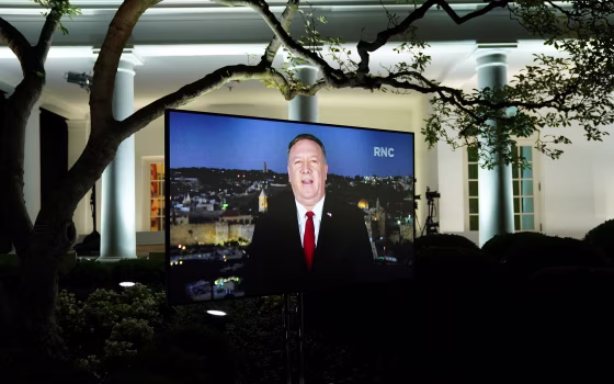Image: U.S. Secretary of State Mike Pompeo is seen giving his live address to the 2020 Republican National Convention from Israel on a TV at the White House in Washington