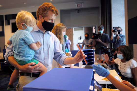 Image: Democratic candidate for the U.S. Senate Joe Kennedy III votes in Newton