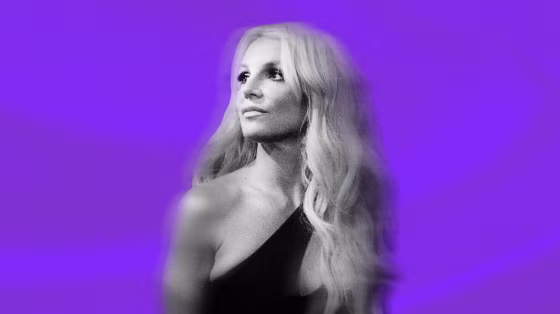 Image: Britney Spears on a background of purple silk.