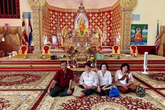 Participants in a wellness program observe Kan Ben, one of the most important spiritual activities among Cambodian Buddhists, at a temple in Long Beach, Calif., in 2019.