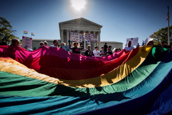 Image: People rally outside of the Supreme Court during arguments on same-sex marriage on April 28, 2015.