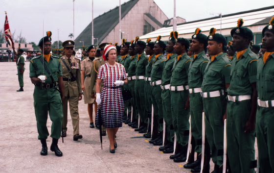 Image: Queen Elizabeth ll inspects a guard of honour as she arrives in Barbados on Oct. 31, 1977 in Barbados.