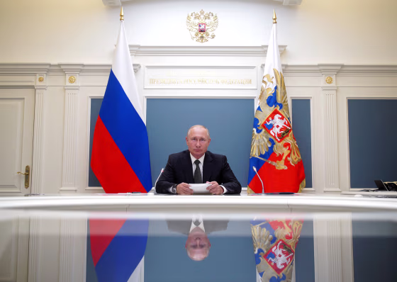 Image: Russian President Putin takes part in a video conference call in Moscow