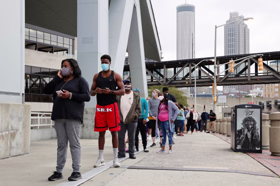 Image: Voters line up to cast their ballots for the upcoming presidential elections in Atlanta