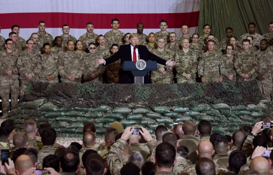 Image: President Donald Trump speaks to the troops during a surprise Thanksgiving day visit at Bagram Air Field in Afghanistan