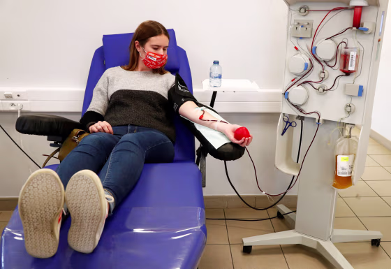 Image: Lili Deneve, who has recovered from coronavirus disease (COVID-19), donates plasma at the Belgian Red Cross blood collection center in Brussels