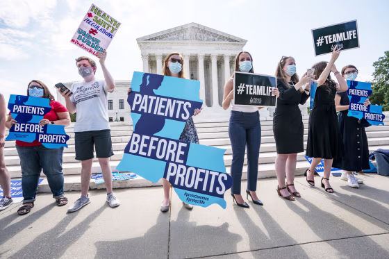 Anti-abortion-rights activists wait outside the Supreme Court for a decision in the Louisiana case Russo v. June Medical Services LLC in Washington on June 25.
