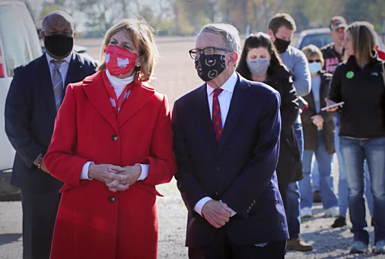 Ohio Gov. Mike DeWine, with his wife, Fran, wait to vote at the Cedarland Event Center on Election Day.