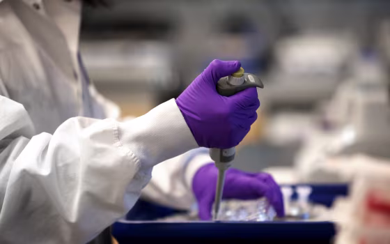 IMage: A scientist works in the Moderna lab in Cambridge, Mass., on Feb 28, 2020.