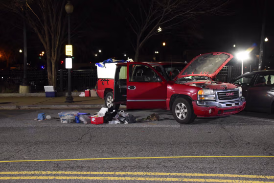While responding to reports of explosive devices in the area, U.S. Capitol Police officers saw the handle of a firearm on the front right passenger seat of Lonnie Coffman's truck.