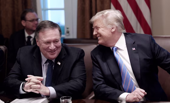 Image: Secretary of State Mike Pompeo and President Trump share a laugh during a cabinet meeting with U.S. President Donald Trump in the Cabinet Room of the White House.