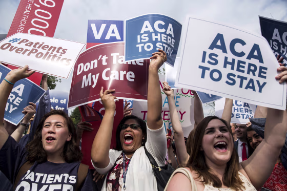 Image: Supporters of the Affordable Care Act celebrate after the Supreme Court up held the law in the 6-3 vote at the Supreme Court in Washington
