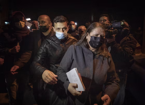 Image: Marwan Barghouti's wife, Fadwa, right leaves the Palestinian Central Election Commission office after registering her husband's list for the upcoming parliamentary election in May, in the West Bank city of Ramallah