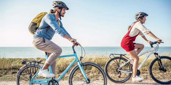 Woman and man biking on the beach, wearing helmets. Shop the best bike helmets of 2021 and learn how to choose the best bike helmet for you. See bike helmets from Schwinn, Cannondale, Giro, ABUS and more.