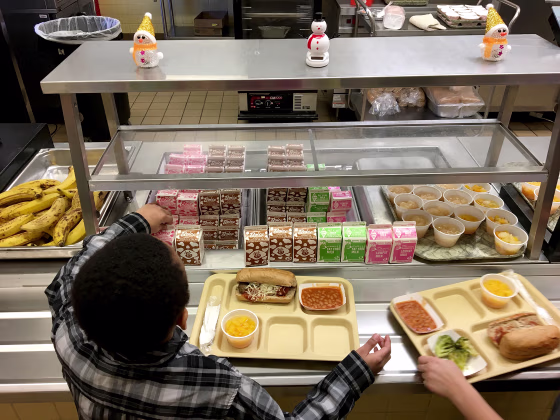 Image: Students fill their lunch trays at J.F.K Elementary School in Kingston, New York on Jan. 25, 2017.