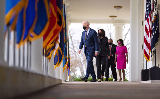 President Joe Biden, Vice President Kamala Harris, Senate Majority Leader Chuck Schumer (D-N.Y.) and Speaker of the House Nancy Pelosi (D-Calif.) arrive to deliver remarks on the American Rescue Plan at the White House on March 12, 2021.