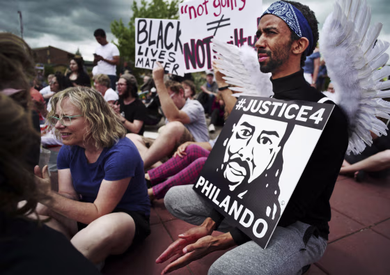 Protesters gathered at Silver Lake Village Shopping Center during a demonstration against the acquittal of Officer Jeronimo Yanez, was found not guilty of manslaughter for shooting Philando Castile during a traffic stop, on June 18, 2017, in St. Anthony,