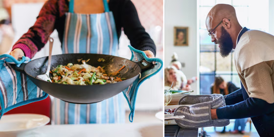 Illustration of a Man making dinner wearing oven gloves and Cooking Wok filled with a steamy dish