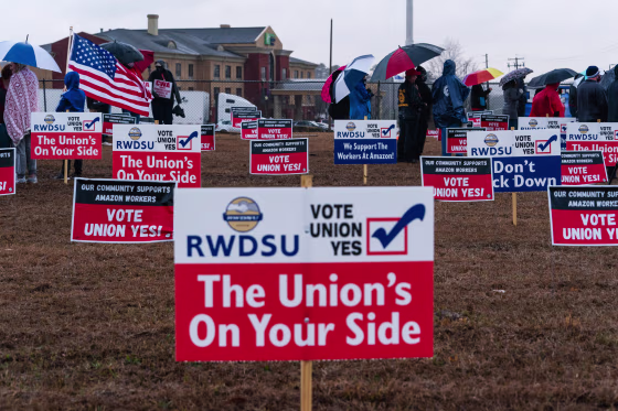Pro-union demonstration signs stand outside the Amazon Fulfillment Center in Bessemer, Ala., on Feb. 7, 2021.