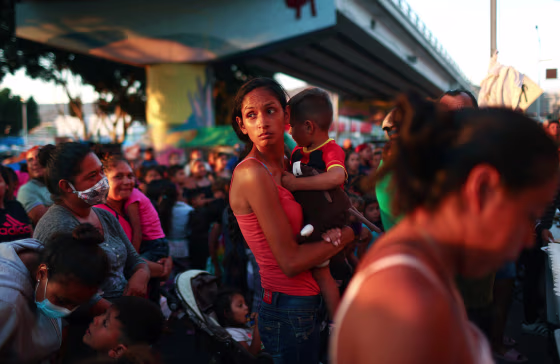 Image: Migrants Huddle In Camps And Shelters In Tijuana Waiting To Cross Into U.S.
