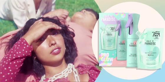 Image of a Young Women Lounging Outside, laying on her friend, blocking the sun out with her hand and the new Isle of Paradise tanning kit