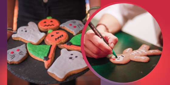 Someone holding a platter of halloween handmade cookies and a kid making skeleton