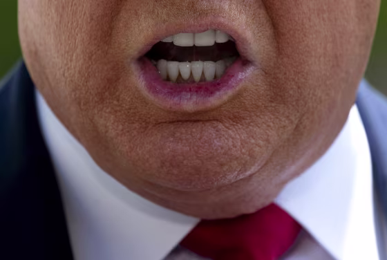 Image: President Donald Trump speaks with members of the media on the South Lawn of the White House on May 30, 2020.