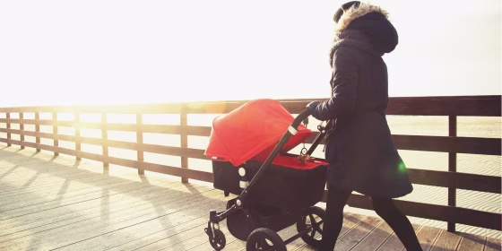 Young mother with stroller