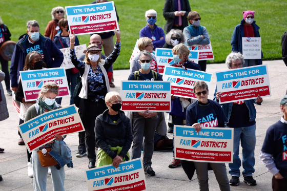 Image: Supporters of Fair Districts in Ohio rally outside the Ohio Statehouse in Columbus, Ohio, after an Ohio Redistricting Commission meeting on Oct. 28, 2021.