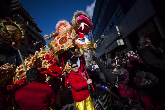 Image: Dragon dancers greet parade-goers during the 14th Annual Chinatown Lunar New Year Parade on Feb. 17, 2013 in New York City.