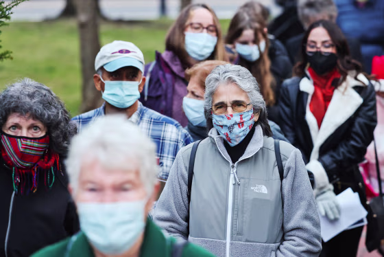 Long Island theater goers wear masks