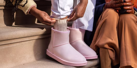 Clean pink winter shoes outside